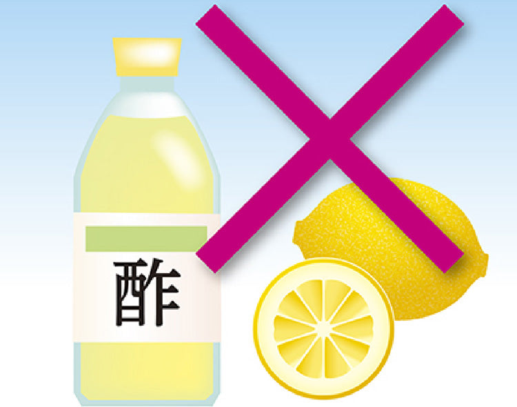 image of an x overtop lemons and vinegar