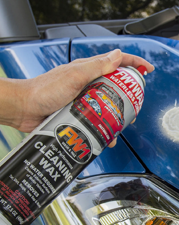 fw1 car wax being sprayed on a blue car