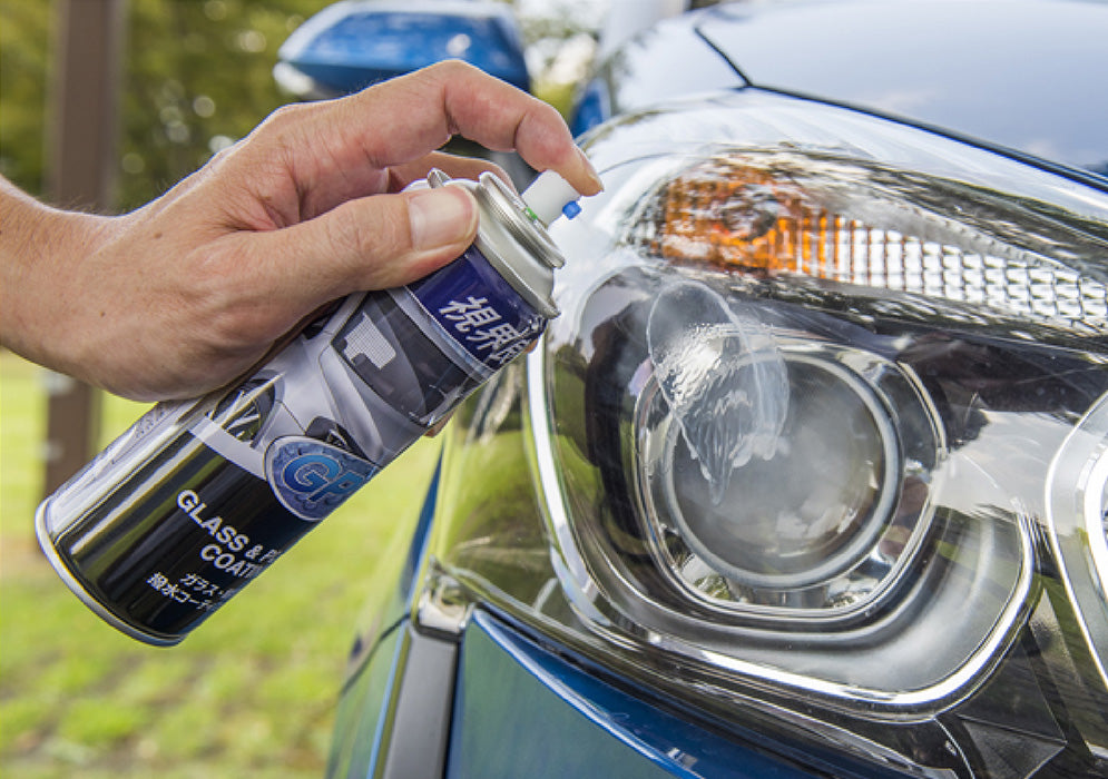 gp1 glass coating being sprayed on a blue car