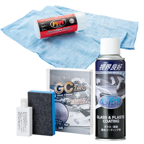 gp1 glass coating and gc zero glass cleaner next to microfiber towel
